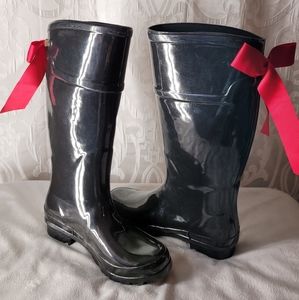 Fashion rain boots, Black flats with red bow.